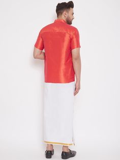 VM by Vastramay Men's Red and White Silk Blend Shirt and Mundu Set Embrace sophistication and tradition with this classic set from VM by Vastramay. This elegant ensemble features a red silk blend shirt and a white mundu, perfect for festive occasions, weddings, or adding a touch of cultural flair to your wardrobe. Key Features: Red silk blend shirt with a comfortable and stylish fit Short sleeves for a versatile look White mundu made from pure cotton for breathability Velcro closure for easy wea Traditional Red Short Sleeve Shirt, Red Short Sleeve Shirt For Festive Occasions, Festive Red Short Sleeve Shirt, Traditional Red Short Sleeve Set, Traditional Red Fitted Shirt, Fitted Traditional Red Shirt, Red Fitted Traditional Shirt, Red Formal Top For Festive Occasions, Red Formal Festive Tops