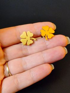 Pretty earrings in the shape of four-leaf clovers. Lucky symbol jewelry. Each leaf of the clover has a unique meaning. The first leaf represents hope, the second symbolizes faith, the third represents love, and finally, the fourth leaf brings luck. Together, these leaves form a harmonious symbol of complete happiness. The earrings are made of golden-colored stainless steel. Stainless steel is a material that does not alter over time, it retains its original color and does not tarnish, it is resi Gold Four Leaf Clover, Four Leaf Clover Ring, Clover Earrings Gold, 4 Leaf Clover Jewelry, 4 Leaf Clover Earrings, Unique Meaning, Lucky Symbols, Clover Earrings, Symbolic Jewelry