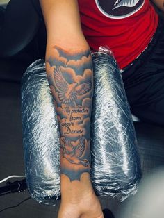 a person with a tattoo on their arm