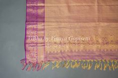 This royal and festive Light Pistachio Green And Purple Kanchi Silk Saree With Blouse features a stunning purple border with intricate gold zari work and comes with a matching blouse with work sleeves. Perfect for traditional occasions, the delicate tassels add a touch of elegance to this timeless piece. Made from high-quality silk, this saree is sure to make you stand out with its luxurious feel.. Blouse With Work, Purple Border, Silk Saree With Blouse, Pistachio Green, Zari Work, Saree With Blouse, Pistachio, Green And Purple, Silk Saree