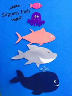 paper cut out of different types of fish on a blue background with words slippery fish