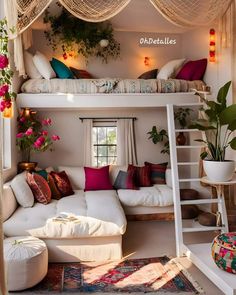 a living room with white couches and lots of pillows on the top bunk bed