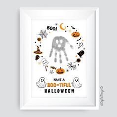 a framed halloween poster with the words boo have a 100 - tiful halloween