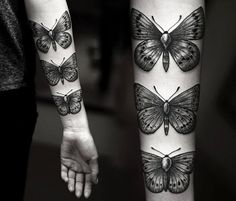 two butterfly tattoos on both arms