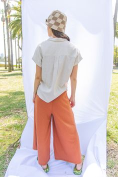 -High Waisted Rib Wide Leg Pants with Pockets-Frilled Elastic Waistband-Wide Leg Palazzo Cut-Front Pockets-Capri-Length-High-Waist95% Polyester 5% Spandex(Model height: 5'9", wearing a Small) Casual High Waist Tops With Elastic Waistband, Pants With Pockets, Model Height, No Frills, Leg Pants, Wide Leg Pants, Capri, Wide Leg, High Waisted