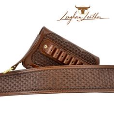 a pair of brown leather straps with the words indiana leathers written on each side