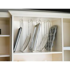 a shelf with some metal items on it