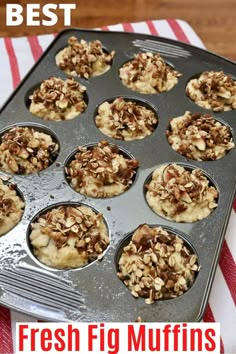 fresh fig muffins in a muffin tin on a red and white striped napkin