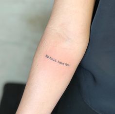 a woman's arm with the words be bold, have fun written on it