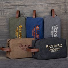 four personalized toiletries are lined up on a wooden surface, one is brown and the other is blue