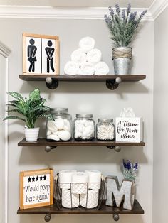 bathroom shelves decorated with toiletries and other items for decor on top of each shelf