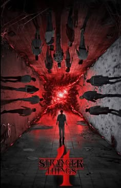 a man standing in the middle of a tunnel with red light coming from his head