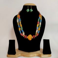 A stunning piece of Handmade Resin Indian Jewelry that embodies the spirit of Hippie and Tribal aesthetics. This unique necklace is a vibrant fusion of colors, culture, and craftsmanship, making it the perfect accessory to express your free-spirited and bohemian vibe. ❋❋ Shipping Methods ❋❋ Standard Delivery - Take up to 8-14 business days (Worldwide). ❋❋ Please be aware that the colors, shades, and texture shown may exhibit minor variations compared to the actual product due to limitations in d Traditional Multicolor Beaded Necklaces As Gift, Festival Gift Necklaces With Colorful Beads, Festive Necklaces With Colorful Beads For Gifts, Festival Gift Necklace With Colorful Beads, Festive Gift Necklaces With Colorful Beads, Colorful Adjustable Traditional Necklaces, Festive Spiritual Beaded Necklaces With Colorful Beads, Festive Spiritual Beaded Necklace With Colorful Beads, Multicolor Gemstone Beads Jewelry For Celebration