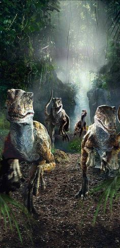 an image of dinosaurs in the forest