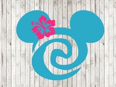 a mickey mouse head with a flower on it's ear is shown in blue and pink