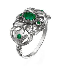 Hand - made 14k gold ring , white gold with 8 diamond and 5 emerald stons. This stunning ring is my last and favorite design . 14k gold ring with emerald and diamonds . Central emerald stone weight : 0.6 carat . Diamond weight : 0.12 carat . Weight ring : 4.2 gram . Top ring length : 2 centimeter . Top ring width : 1.4 centimeter . Silver Emerald Ring With Diamond Accents, Platinum Emerald Ring In White Gold, Heirloom Emerald Ring With 17 Jewels In Platinum, Heirloom Platinum Emerald Ring With 17 Jewels, Fine Jewelry Silver Emerald Cluster Ring, Silver Ring With Emerald And Diamond Accents, Exquisite Silver Emerald Ring With Prong Setting, Vintage Silver Emerald Ring With Rose Cut Diamonds, Silver Emerald Ring With Rose Cut Diamonds For Promise