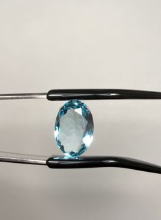 About The Stone: This gemstone is oval shaped 14mm x 10mm x 5mm (LxWxH) faceted simulated aquamarine gemstone. -Named after the color of sea water, aquamarine is the blue to blue-green member of the beryl family. The birthstone for March, it represents exhilaration as well as relaxing calm. Once believed to be the treasure of mermaids, it was often worn by sailors and travelers as a talisman to protect against being shipwrecked and to ward off sea sickness. -Simulated gems look like natural gems Blue Oval Gemstones, Blue Faceted Oval Gemstones, Faceted Blue Oval Gemstones, Blue Oval Faceted Gemstones, Sea Sickness, London Blue Topaz Ring, Sea Water, Luxury Rings, Blue Gems