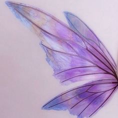 a drawing of a purple butterfly with wings spread out, sitting on a white surface