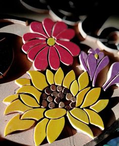 some cookies decorated with flowers on top of a table