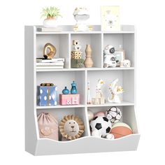 a white book shelf filled with lots of toys