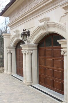 a large brown garage door sitting on the side of a building