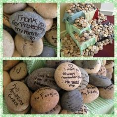 some rocks with writing on them, and one has a bag full of rocks in it