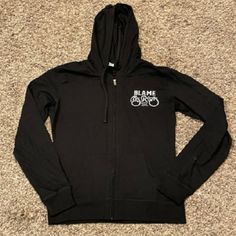 Black Hoodie. Light. 60% Cotton 40% Polyster Never Worn Black Hoodie For Concert Winter Season, Black Hooded Sweatshirt For Concert, Black Hoodie For Winter Concert, Black Winter Hoodie For Concert, Black Casual Hoodie For Concerts, Casual Hoodie Sweatshirt For Concert, Cotton Hoodie For Fall Concerts, Black Casual Sweatshirt For Concert, Casual Black Sweatshirt For Concert