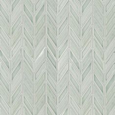 a green and white tile wallpaper with an abstract herringbone pattern in the middle