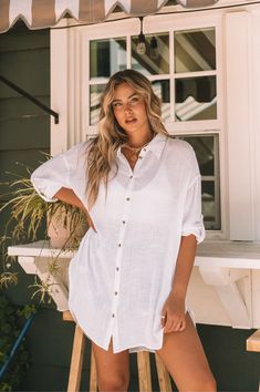 ~ 55% Linen, 45% Viscose ~ Oversized tunic length ~ Long sleeve button up ~ Curved U-shape hem ~ High-low length ~ Can wear as a long sleeve or as a 3/4 sleeve ~ Model is 5'9" wearing a size Medium Vacation Button-up Shirt With Button Cuffs, 3/4 Sleeve Shirt Dress For The Beach, Relaxed Fit Shirt Dress For Beach In Fall, Casual Beach Tunic With 3/4 Sleeves, Casual 3/4 Sleeve Beach Tunic, Oversized Button-up Shirt Dress For Beach, Spring Vacation Blouse With Button Cuffs, Oversized Button-up Shirt Dress For Vacation, Summer Tunic With Button Closure