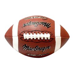 an american football on a white background with the words michigan in black and white lettering