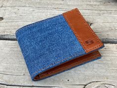 Introducing a Hand crafted Designer Denim and Leather Blend Bi-fold Wallet By Christoph Joseph DETAILS: - Nice Contrast of Genuine Calf  Leather and Blue Levis Denim - Rugged, Fashionable , comfortable and durable - 100% Proudly Handmade in America - Expertly crafted with attention to detail. - 100% Hand sewn - Beautiful rich luxurious hand dyed and burnished light brown interior calf leather - Water Resistant Finish - Outfitted with a small Handtooled Christoph Joseph Brand Accent - Measures 3. Casual Trifold Wallet For Daily Use, Casual Blue Bifold Wallet, Casual Leather Trifold Wallet, Casual Bifold Wallet For Everyday Use, Light Brown Interior, Jean Wallet, Money Clips, Designer Denim, Brown Interior