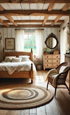 a bedroom with wooden beams and white bedding, rugs on the wood floor