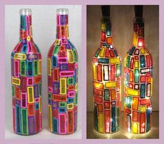 there are three bottles made out of different colored glass blocks and one has a light on it