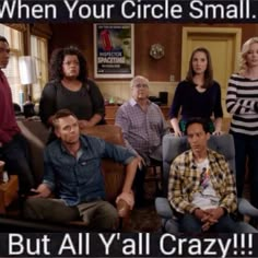 a group of people sitting around each other in front of a sign that says, when your circle small but all y'all crazy