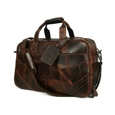 The Aaron Leather Duffle Bag is the perfect accessory for anyone who loves to travel. This handsome bag is made of high-quality hard wax buffalo leather and is stitched by world-class craftsmen. It features a stylish and vintage look, with strong and reliable interiors. The bag comes with 1 large compartment and zippered pockets, making it ideal for holding all of your essentials while traveling. Size: M.  Color: Multicolor.  Gender: unisex.  Age Group: adult. Rectangular Outdoor Travel Bag With Top Carry Handle, Outdoor Rectangular Travel Bag With Top Carry Handle, Shoulder Bag Duffle For Overnight Trips, Rectangular Travel Bag With Reinforced Handles For Weekend Trips, Practical Brown Rectangular Travel Bag, Practical Backpack For Overnight Trips, Practical Rectangular Duffle Bag, Practical Rectangular Weekender Bag For Overnight Trips, Outdoor Satchel Bag With Luggage Sleeve