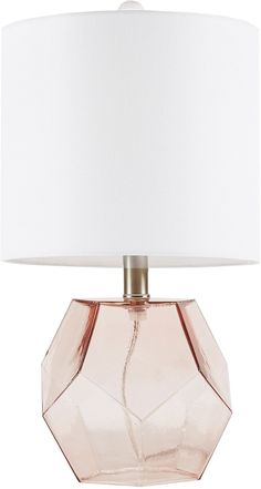 a pink glass table lamp with a white shade