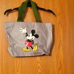 Excellent Condition Never Used Smoke Free Disney Style Shoulder Bag For Everyday Use, Casual Bags With Character Print For Daily Use, Disney Character Print Bags For Disney Trips, Playful Mickey Mouse Bags For Disney Trips, Disney Character Print Multicolor Bags, Disney Tote Bag For Everyday Use, Casual Rectangular Bag For Disney Trips, Playful Minnie Mouse Travel Bag, Mickey Mouse Tote Bags For Daily Use