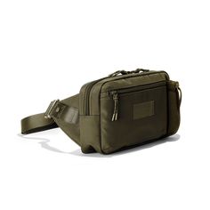 Not to start any rumors, but if Ace and Nova had a baby, it would be the Cairo Sling Bag. Just a touch bigger than our classic fanny, this smartly designed slim sling bag in dark green for travel lets you bring water, your passport, headphones, a book, and more along for the adventure. Equally perfect for exploring new cities and daily errands at home, this sustainable sling is mindfully made so it’s light on you and the planet, too. Dagne Dover, Crossbody Bags For Travel, Travel Purse, Top Backpacks, Small Crossbody, New City, Simple Bags, Laptop Backpack, Cairo