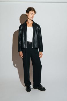 A vintage inspired vegan leather blouson. Our modern interpretation of a wardrobe classic that is both effortlessly cool & elegantly refined. Regular-fit with a slight crop to taper into the waist. Crafted from a buttery smooth, vegan leather that looks and feels like the real thing.