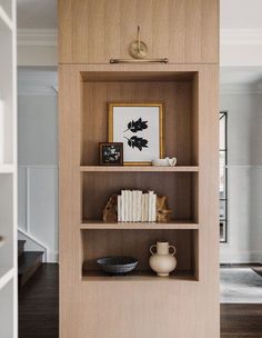 an open book shelf with books on it