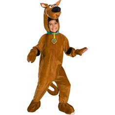 a young boy in a dog costume is standing with his hands out to the side