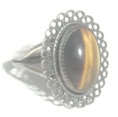 "Vintage Tiger Eye Ring Sterling Silver Ring Southwest Size 6 Adjustable Weight 4.3g Length 7/8\" Width 5/8\" Free Shipping & Free Postal Insurance Delivered in a Gift Box If you do not want the ring polished and want to leave the natural patina please let me know at the time of purchase as I do polish rings before I ship rings out. Thanks USPS Domestic Shipping is free for buyers. If a buyer prefers to upgrade to priority, the buyer will pay that portion of the shipping charge. If the actua Nickel Free Oval Crystal Ring, Adjustable Oval Crystal Ring, Adjustable Oval Brown Rings, Adjustable Oval Rings In Brown, Irish Rings, Friendship Rings, Claddagh Rings, Celtic Rings, Eye Ring