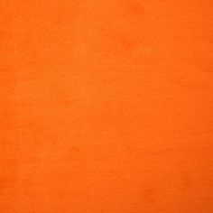 an orange background with some small white dots