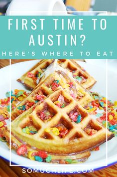 some waffles on a plate with the words, first time to ausin? here's where to eat