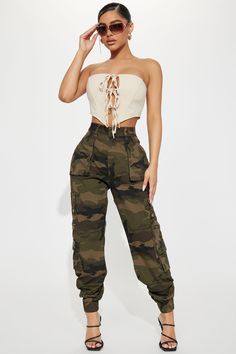 Available In Olive/combo. Camo Cargo Jogger High Rise Button And Zipper Closure Hand Pockets Utility Pockets Zipper Detail Stretch 30" Inseam Disclaimer: Pattern Placement May Vary 98% Cotton 2% Spandex Imported | Have It All Cargo Camo Jogger Pant in Olive Green size Small by Fashion Nova Military Style Olive Parachute Pants With Pockets, Olive Military Cargo Pants, Olive Military Pants With Cargo Pockets, Spring Camouflage Full-length Cargo Pants, Military Cargo Jeans With Camouflage And Side Pockets, Camo Jogger Pants, Camo Joggers, Olive Green Jacket, Camo Pants