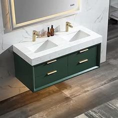 a bathroom vanity with two sinks and a mirror on the wall above it that is illuminated