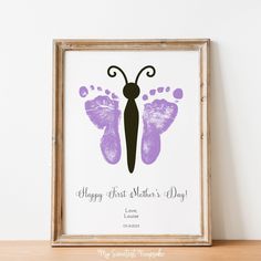 a purple and black butterfly print with the words happy first mother's day on it