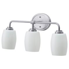 three light bathroom fixture in chrome finish with white glass shades on the sides and arms