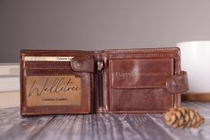 Dark Brown genuine leather wallet which can be personalized engraved outside & inside, Presented in a luxury gift box, this wallet would make the perfect gift for him, anniversary gift, Fathers Day Gift,  Birthday gift, Best man, thank you gift and many more special occasions. Fine Details *Bifold Leather Wallet *10 Card Sections *2 Compartments for Bank Notes *Coin Pocket with Tab Closure *2 Multi-Purpose Pockets (can hold 3 - 4 cards on each side) *3 Transparent ID Window Sections *Centre Zip Bifold Wallet With Engraved Logo As Gift, Leather Wallets With Engraved Logo Gift, Engraved Bifold Wallets For Gift, Engraved Bifold Wallets As Gifts, Engraved Bifold Wallet As Gift, Father's Day Wallets With Coin Pocket, Father's Day Gift Wallets With Coin Pocket, Father's Day Gift Wallet With Coin Pocket, Gift For Boyfriend Anniversary