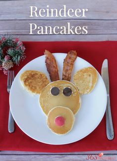 a white plate topped with pancakes covered in bacon and a mouse face made out of pancakes